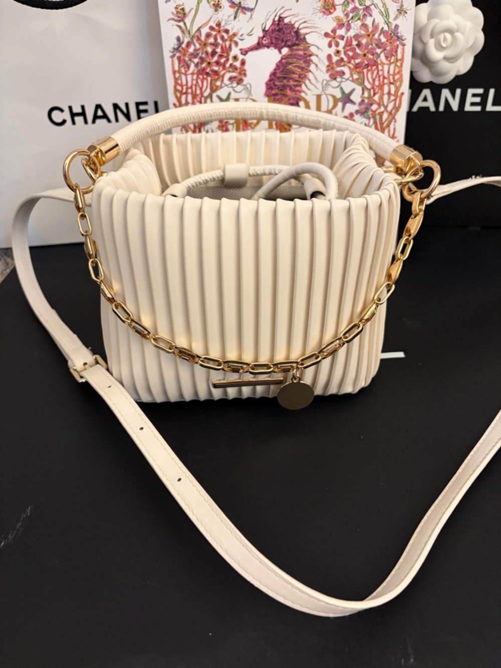 Cream Pleated Bucket Bag with Gold Chain Accent